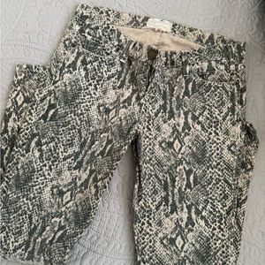 Snakeskin print skinny jeans